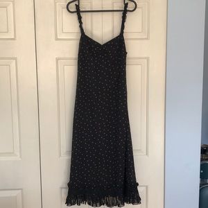 Black polka dot midi dress